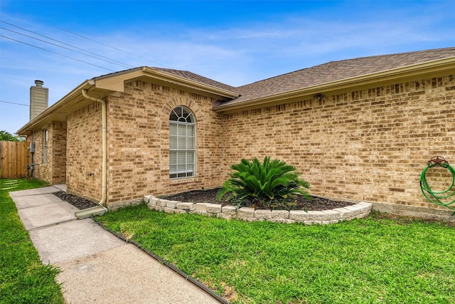 19822 Laurel Trail Dr, Cypress, TX 77433 - view of side of property with brick siding, a chimney, and a shingled roof