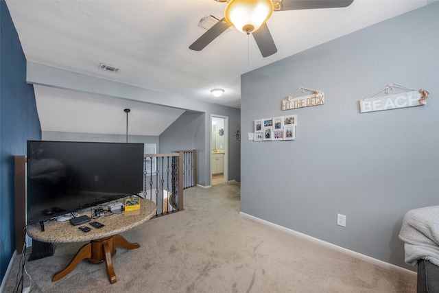 103 Jean Lafitte Cv, Galveston, TX 77554 - sitting room with ceiling fan, carpet flooring, baseboards, and an upstairs landing