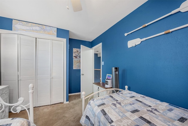 103 Jean Lafitte Cv, Galveston, TX 77554 - carpeted bedroom with a closet and a ceiling fan