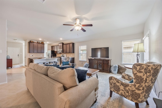 23715 Rivage Ridge Dr, Katy, TX 77493 - living room with a ceiling fan, baseboards, and recessed lighting