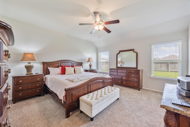 23715 Rivage Ridge Dr, Katy, TX 77493 - bedroom featuring light carpet, vaulted ceiling, baseboards, and ceiling fan