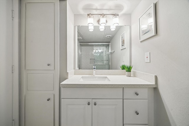 3944 W Alabama St Unit 12, Houston, TX 77027 - bathroom featuring vanity and a shower
