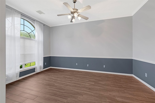 7818 Silver Lure Dr, Humble, TX 77346 - spare room with ornamental molding, healthy amount of natural light, wood finished floors, baseboards, and a ceiling fan