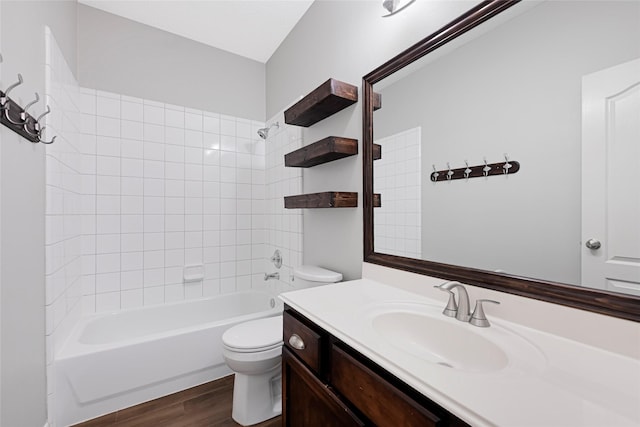 7818 Silver Lure Dr, Humble, TX 77346 - bathroom with toilet, wood finished floors, vanity, and shower / bathtub combination