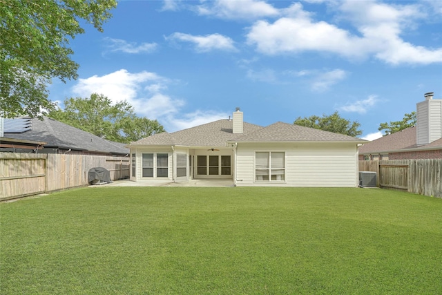 7818 Silver Lure Dr, Humble, TX 77346 - rear view of property with a ceiling fan, a patio area, a chimney, and central AC