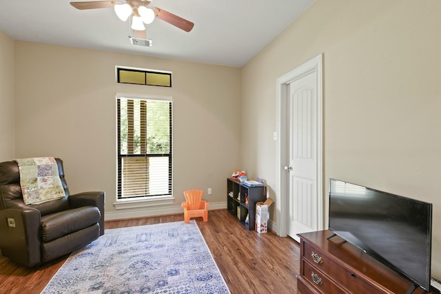531 Private Road 6350, Dayton, TX 77535 - sitting room with wood finished floors and ceiling fan