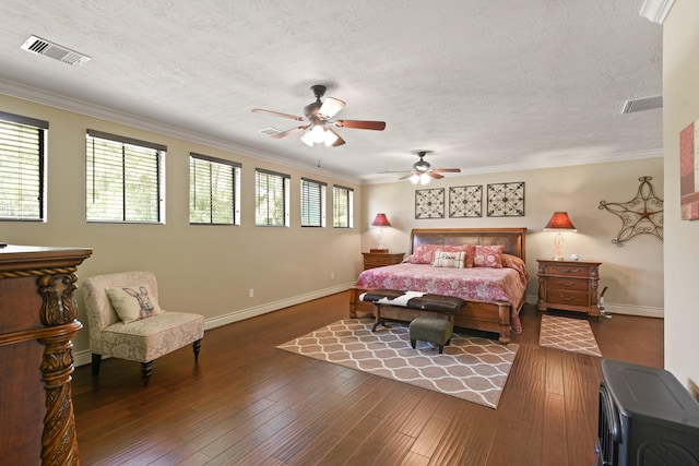 531 Private Road 6350, Dayton, TX 77535 - bedroom with crown molding, hardwood / wood-style floors, a textured ceiling, and ceiling fan
