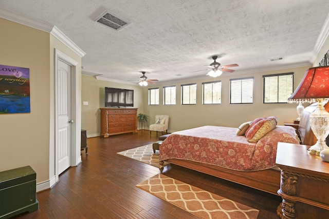 531 Private Road 6350, Dayton, TX 77535 - bedroom with ornamental molding, wood-type flooring, and a textured ceiling
