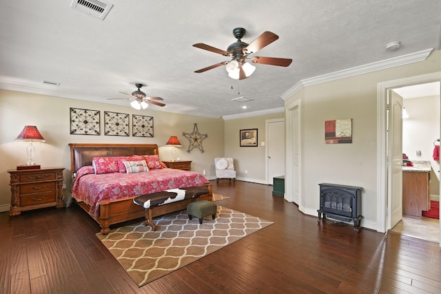 531 Private Road 6350, Dayton, TX 77535 - bedroom featuring wood-type flooring, a textured ceiling, crown molding, a ceiling fan, and connected bathroom