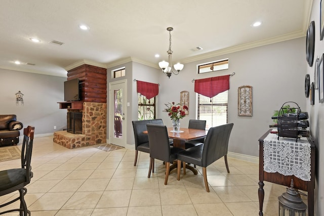 531 Private Road 6350, Dayton, TX 77535 - dining area featuring recessed lighting, light tile patterned floors, crown molding, a stone fireplace, and a chandelier