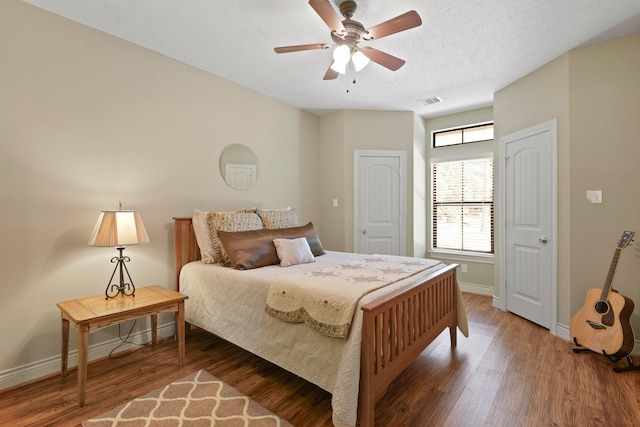 531 Private Road 6350, Dayton, TX 77535 - bedroom with wood finished floors and ceiling fan