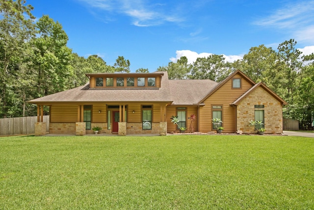 531 Private Road 6350, Dayton, TX 77535 - view of front facade featuring a porch, a shingled roof, and stone siding