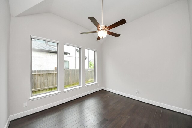 12813 N Palomino Lake Cir, Cypress, TX 77429 - empty room featuring vaulted ceiling, ceiling fan, dark wood finished floors, and baseboards