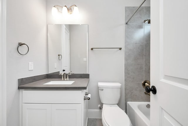 12813 N Palomino Lake Cir, Cypress, TX 77429 - bathroom with vanity, toilet, washtub / shower combination, and baseboards