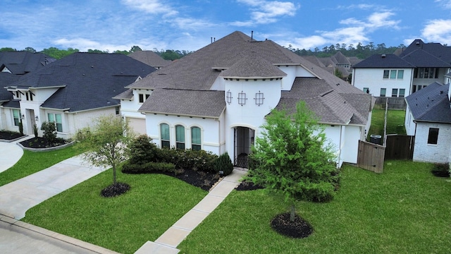12813 N Palomino Lake Cir, Cypress, TX 77429 - french country home featuring roof with shingles, a residential view, driveway, and stucco siding