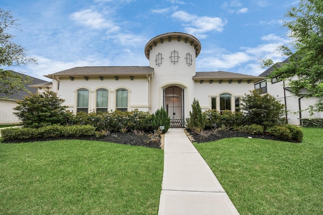 12813 N Palomino Lake Cir, Cypress, TX 77429 - view of front facade with stucco siding, a front yard, and roof with shingles