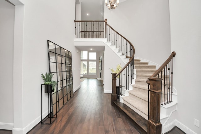 12813 N Palomino Lake Cir, Cypress, TX 77429 - entrance foyer with hardwood / wood-style floors, stairs, baseboards, a high ceiling, and recessed lighting