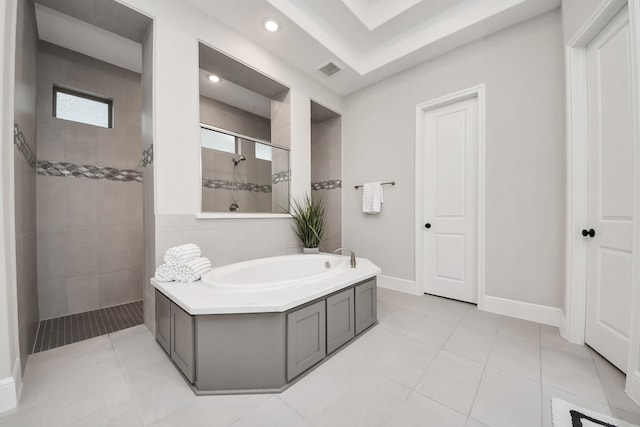 12813 N Palomino Lake Cir, Cypress, TX 77429 - bathroom featuring a garden tub, a tile shower, tile patterned flooring, recessed lighting, and baseboards