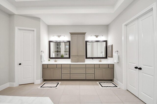 12813 N Palomino Lake Cir, Cypress, TX 77429 - full bath with double vanity, tile patterned floors, and baseboards