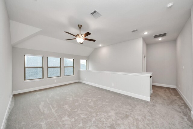 12813 N Palomino Lake Cir, Cypress, TX 77429 - carpeted empty room featuring a smoke detector, baseboards, vaulted ceiling, a ceiling fan, and recessed lighting