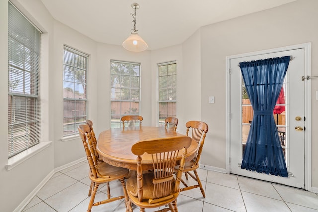 9715 Therrell Dr, Houston, TX 77064 - dining space with light tile patterned floors and baseboards