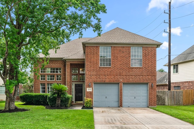 9715 Therrell Dr, Houston, TX 77064 - traditional-style house with concrete driveway, brick siding, a garage, and roof with shingles