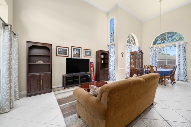 9715 Therrell Dr, Houston, TX 77064 - living area with a towering ceiling, crown molding, light tile patterned floors, and baseboards