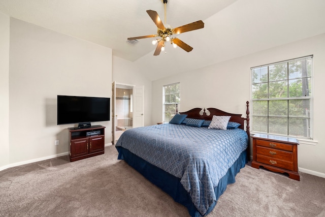 9715 Therrell Dr, Houston, TX 77064 - bedroom with light carpet, baseboards, lofted ceiling, a ceiling fan, and connected bathroom