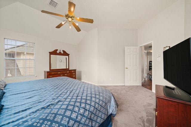 9715 Therrell Dr, Houston, TX 77064 - carpeted bedroom featuring lofted ceiling, baseboards, and a ceiling fan