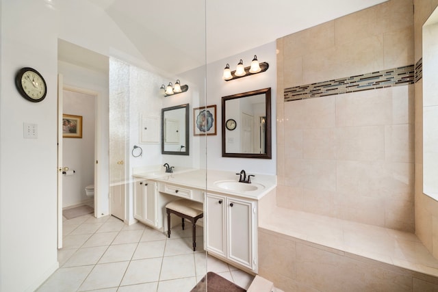 9715 Therrell Dr, Houston, TX 77064 - full bathroom featuring tile patterned floors, double vanity, and toilet