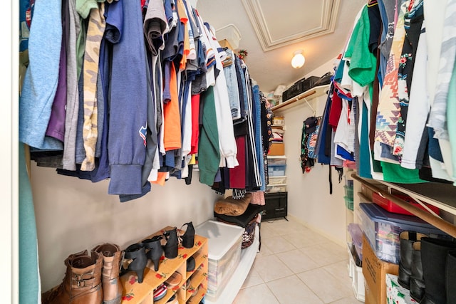 9715 Therrell Dr, Houston, TX 77064 - spacious closet with tile patterned flooring