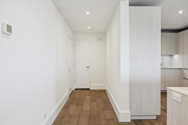 1701 Hermann Dr Unit 27Ce, Houston, TX 77004 - corridor featuring wood finished floors, recessed lighting, and baseboards