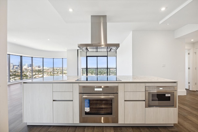 1701 Hermann Dr Unit 27Ce, Houston, TX 77004 - kitchen with oven, range hood, black electric stovetop, modern cabinets, and recessed lighting