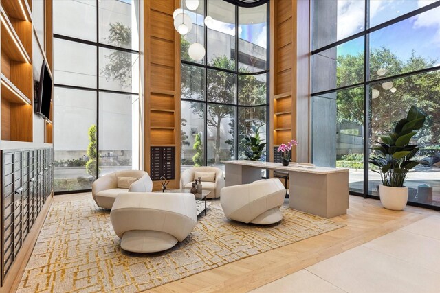 1701 Hermann Dr Unit 27Ce, Houston, TX 77004 - lobby featuring expansive windows and a towering ceiling