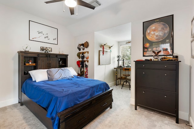 38 Agate Stream Pl, The Woodlands, TX 77381 - bedroom featuring baseboards, light carpet, and a ceiling fan