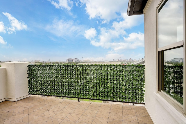 9622 Fannin Sta W, Houston, TX 77045 - view of patio with a balcony and a city view