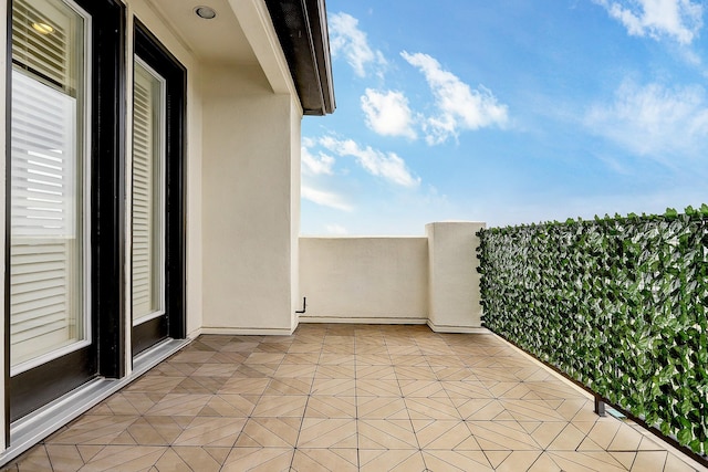 9622 Fannin Sta W, Houston, TX 77045 - view of patio featuring a balcony