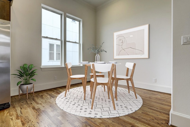 9622 Fannin Sta W, Houston, TX 77045 - dining room featuring ornamental molding, wood finished floors, and baseboards