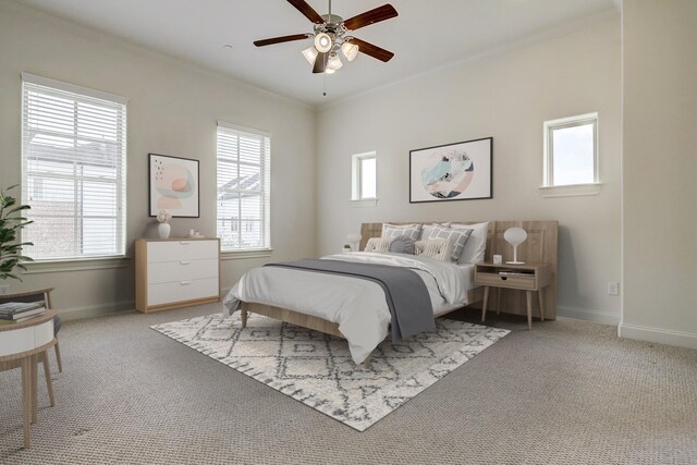 9622 Fannin Sta W, Houston, TX 77045 - carpeted bedroom featuring multiple windows, baseboards, ornamental molding, and ceiling fan