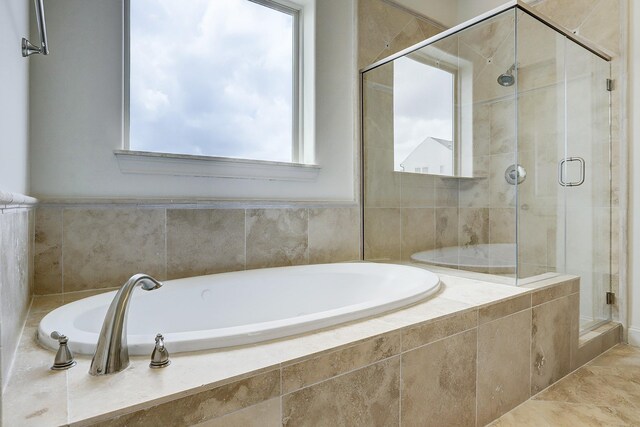 9622 Fannin Sta W, Houston, TX 77045 - full bath featuring a shower stall and a garden tub