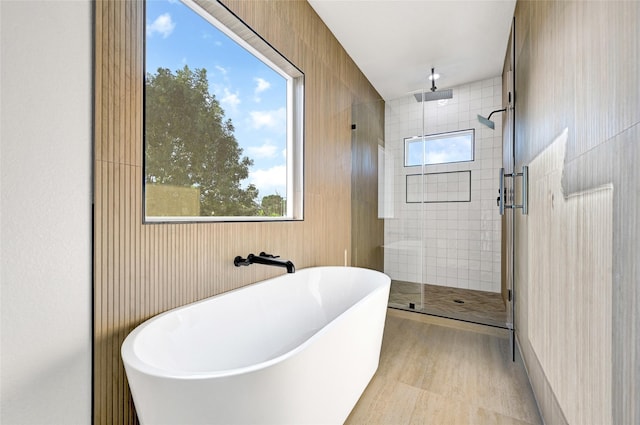 5107 New Orleans St, Houston, TX 77020 - full bath featuring a stall shower and a freestanding tub
