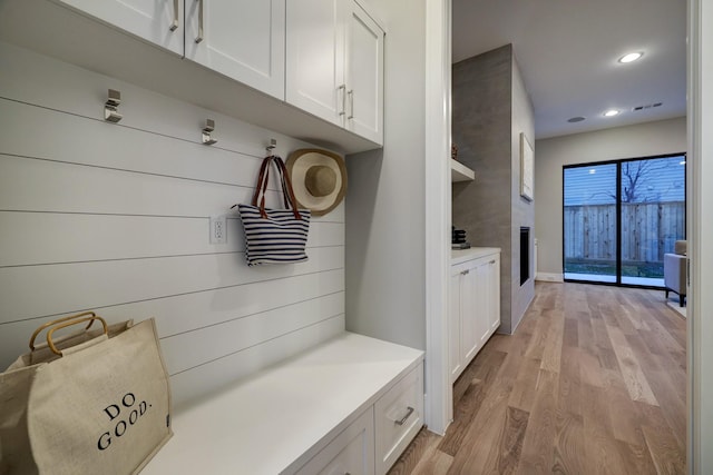 2920 Georgetown St, Houston, TX 77005 - mudroom with light wood-type flooring, recessed lighting, and baseboards