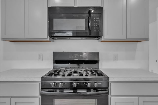 4625 Peralta Heights Way, Porter, TX 77365 - kitchen with black appliances and light countertops