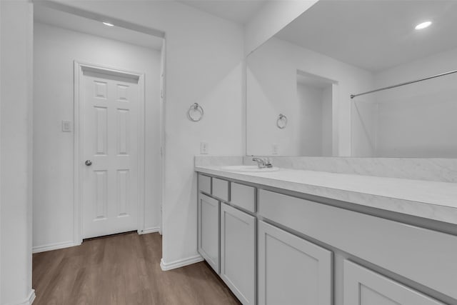 4625 Peralta Heights Way, Porter, TX 77365 - bathroom with vanity, wood finished floors, recessed lighting, and a shower