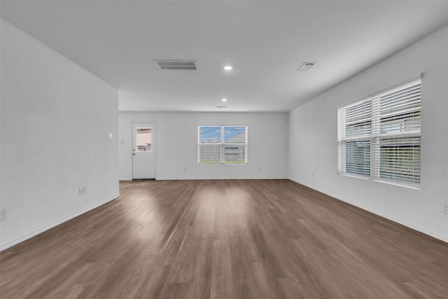 4625 Peralta Heights Way, Porter, TX 77365 - unfurnished room featuring wood finished floors and recessed lighting