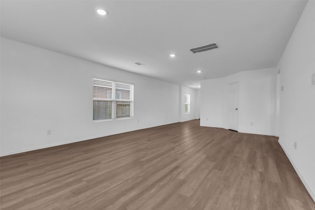 4625 Peralta Heights Way, Porter, TX 77365 - unfurnished living room with wood finished floors and recessed lighting
