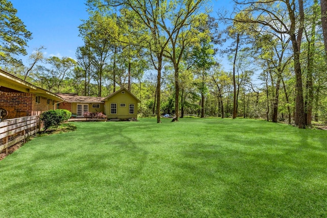 3027 Pine Acres Dr, Conroe, TX 77384 - view of green lawn
