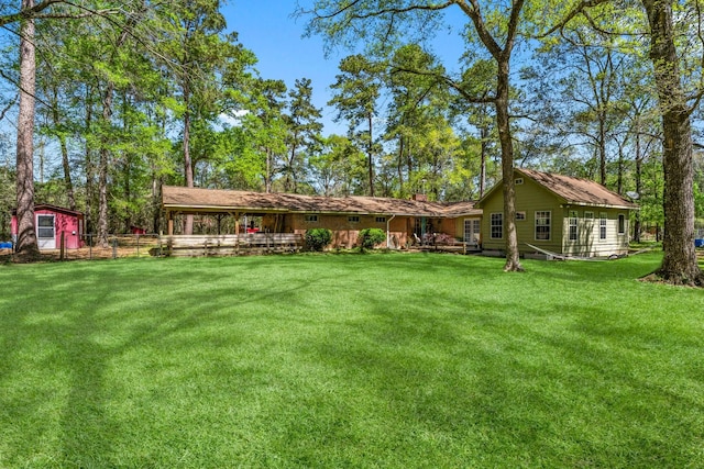 3027 Pine Acres Dr, Conroe, TX 77384 - view of green lawn
