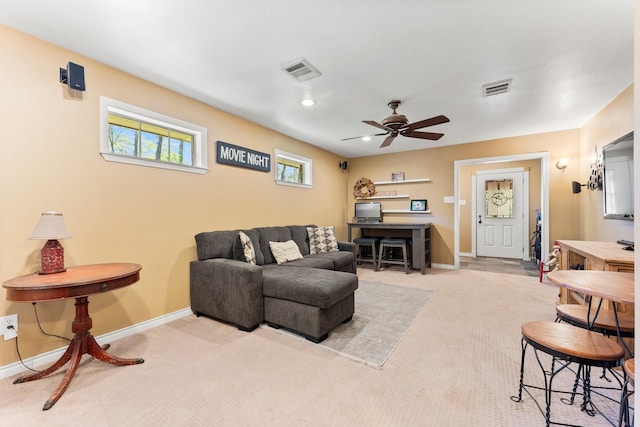 3027 Pine Acres Dr, Conroe, TX 77384 - carpeted living area with a ceiling fan and baseboards