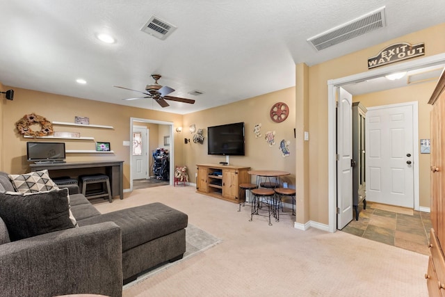 3027 Pine Acres Dr, Conroe, TX 77384 - carpeted living area featuring baseboards, a ceiling fan, and recessed lighting